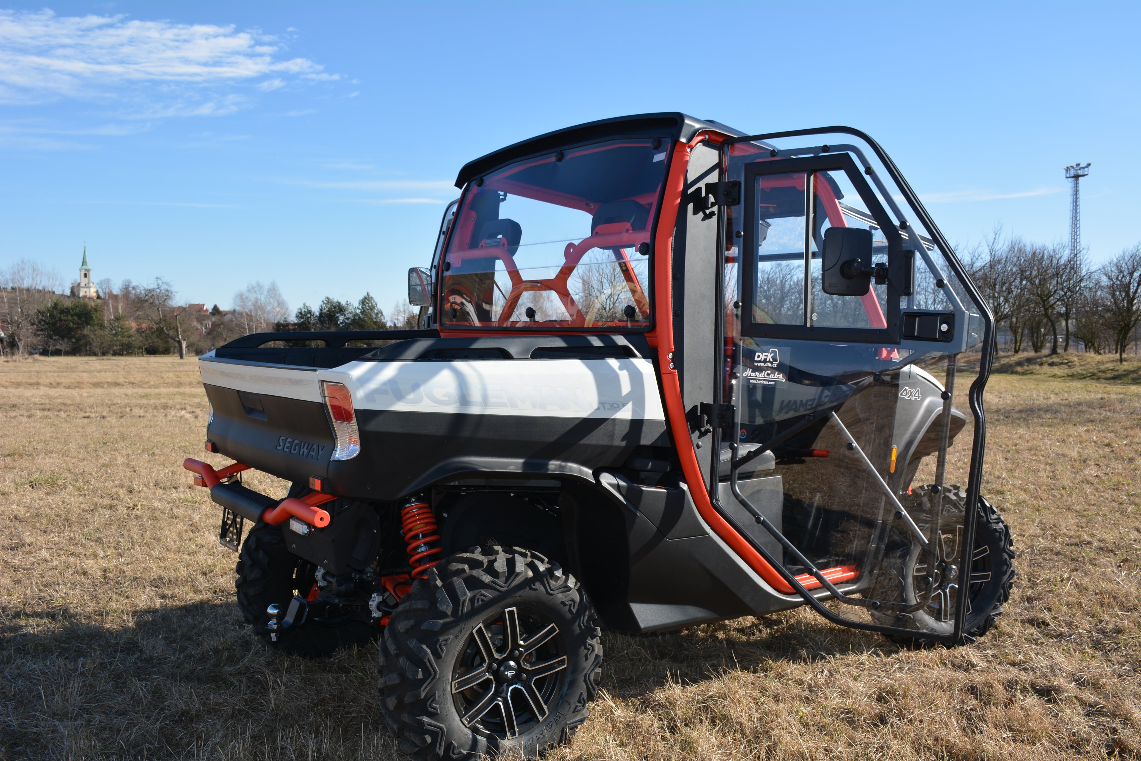 Segway Fugleman UT10 with HardCabs premium cab, front three-quarter view